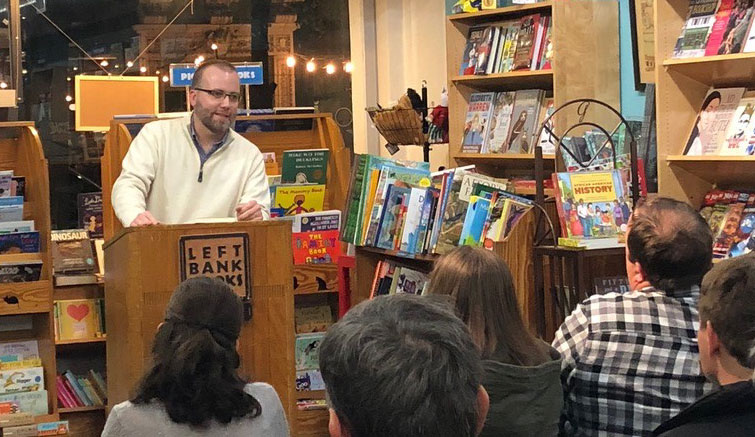 Dr. Ben Cooper, Assistant Professor of English, speaks about his book, Veteran Americans: Literature and Citizenship from Revolution to Reconstruction, before an engaged crowd at Left Bank Books.