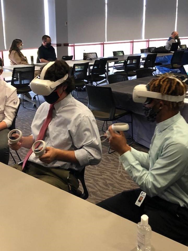 Geographic Information Systems (GIS) Students Using VR Headsets