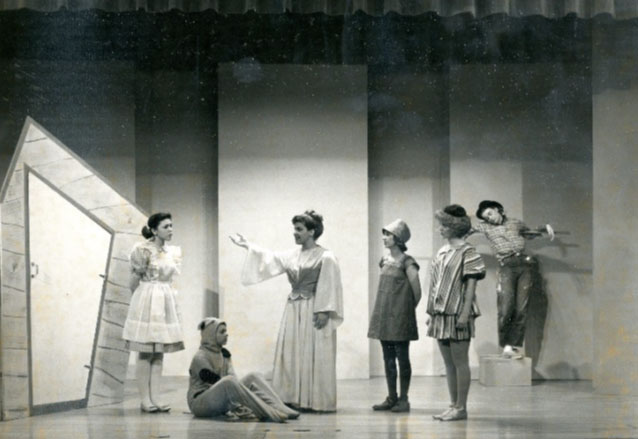 Students on stage performing The Wizard of Oz in 1964.