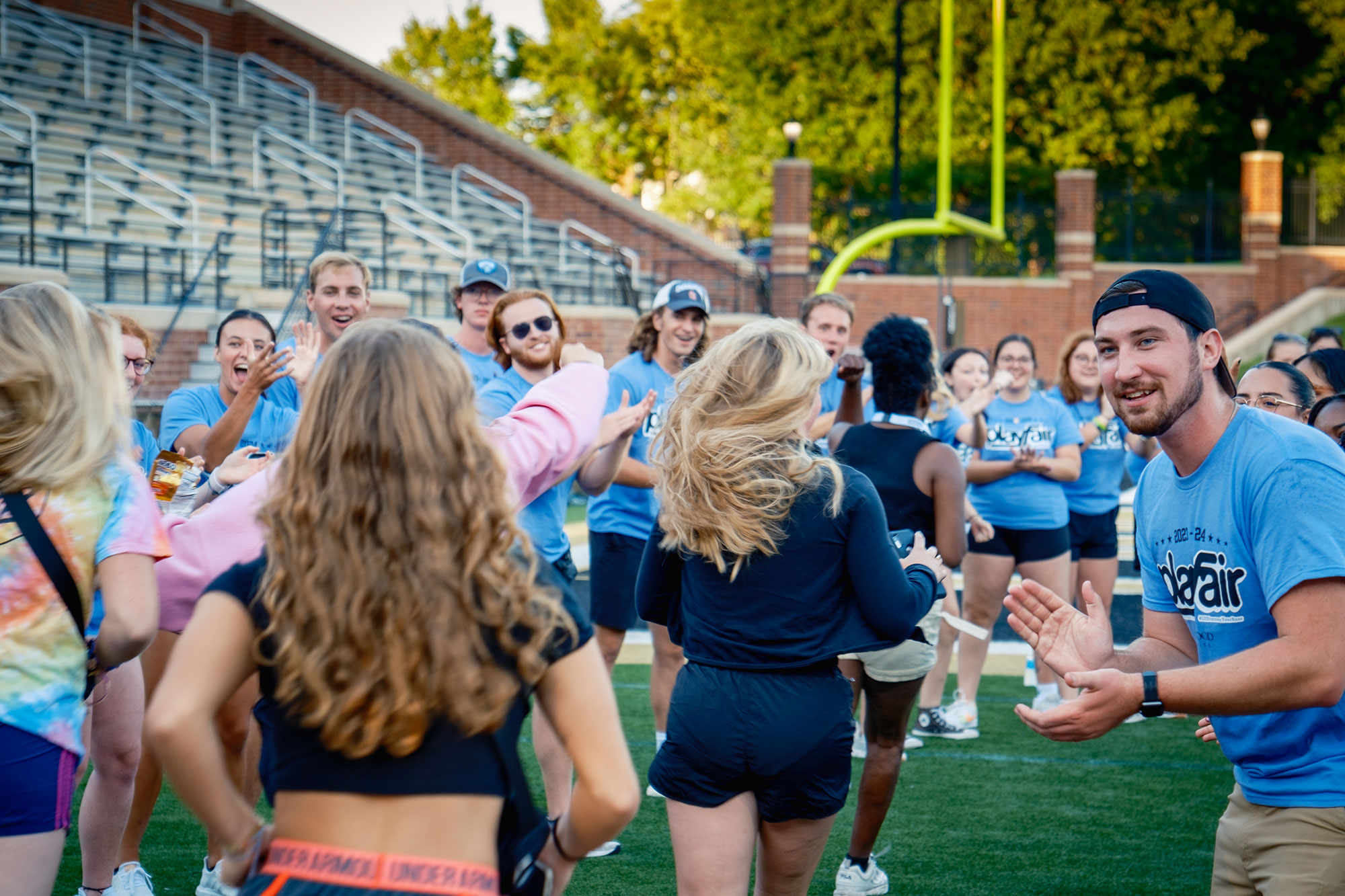 Students at orientation doing games outside