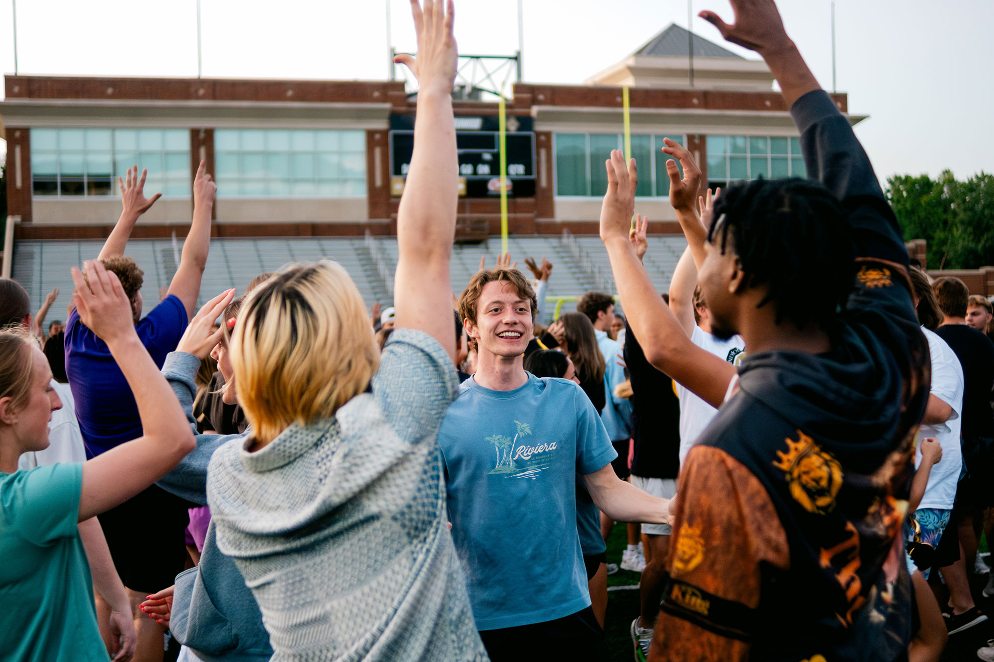 Students outside doing team building